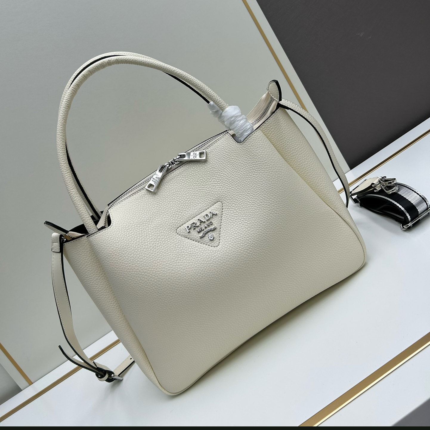 Pra*a top handle bags